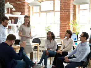 White and gray striped crew neck sweater in Engaging Staff article