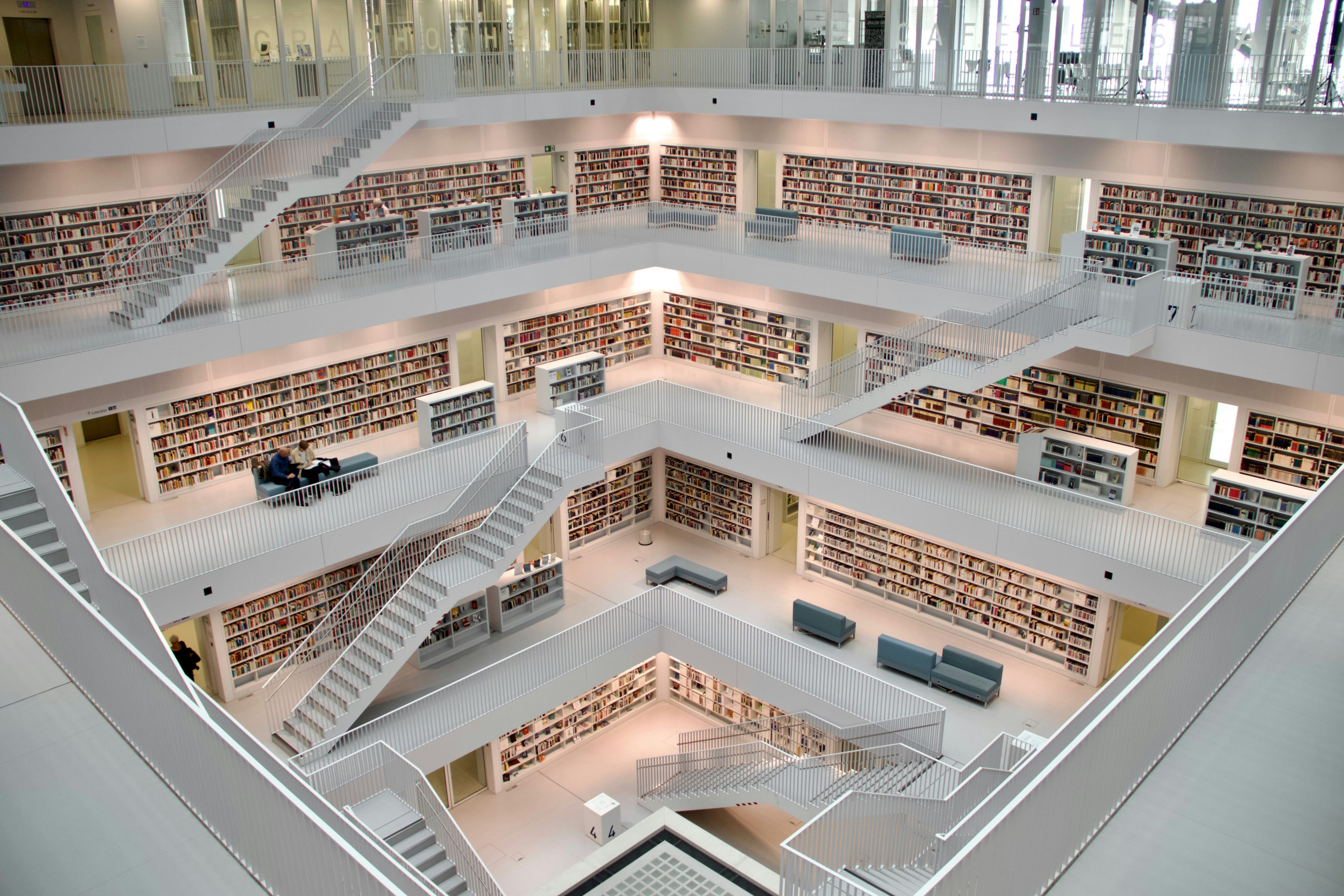 Stuttgart City Library interior with rows of white bookshelves and symmetrical geometric architecture, representing structured document intelligence and the organised knowledge retrieval Docflows.AI delivers for document-heavy organisations.